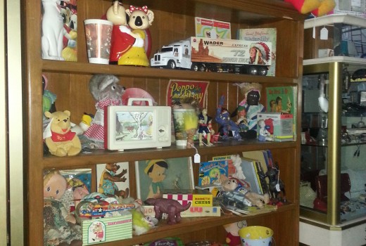 Bookcase full of Vintage Toys